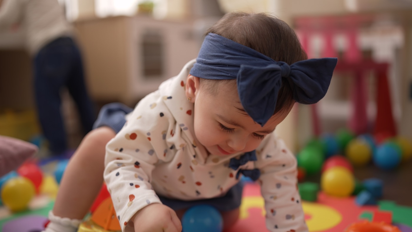 Toddler playing with balls at daycare Edison Roselle NJ — Little Einsteins Academy
